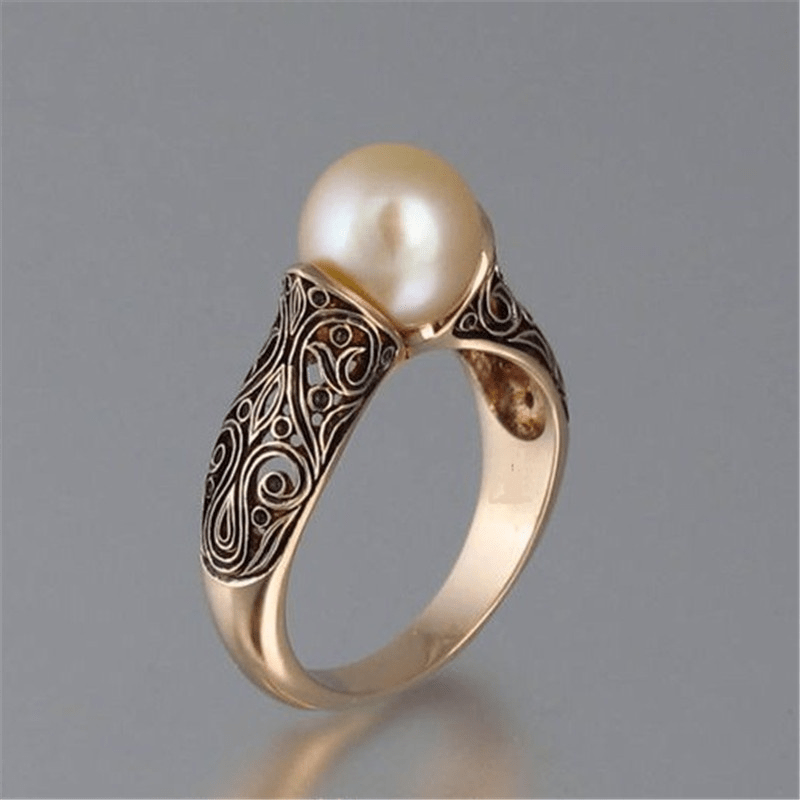 Bague vintage en perle dorée